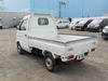 It is a picture of the white suzuki carry truck in 2002,Sub Photo 3 Stock No.Y034317