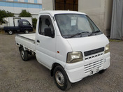 It is a picture of the white suzuki carry truck in 2002,First Photo Stock No.Y034317