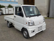It is a picture of the white mitsubishi minicab truck in 1999,First Photo Stock No.Y034383