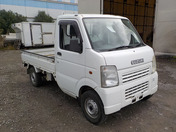 It is a picture of the white suzuki carry truck in 2003,First Photo Stock No.Y034422
