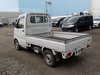 It is a picture of the white suzuki carry truck in 2003,Sub Photo 3 Stock No.Y034422