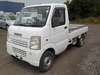 It is a picture of the white suzuki carry truck in 2003,Sub Photo 1 Stock No.Y034422