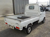 It is a picture of the white suzuki carry truck in 2002,Sub Photo 3 Stock No.Y034538