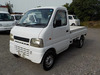 It is a picture of the white suzuki carry truck in 2002,Sub Photo 1 Stock No.Y034538