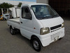 It is a picture of the white suzuki carry truck in 2002,Sub Photo 0 Stock No.Y034538
