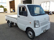 It is a picture of the white suzuki carry truck in 2012,First Photo Stock No.Y034671