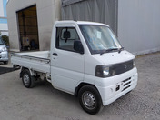 It is a picture of the white mitsubishi minicab  truck in 2000,First Photo Stock No.Y034741