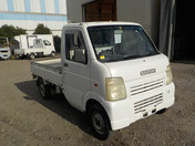 It is a picture of the white suzuki carry truck in 2002,First Photo Stock No.Y034918