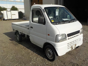 It is a picture of the white suzuki carry truck in 2001,First Photo Stock No.Y034919
