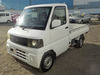 It is a picture of the white mitsubishi minicab  truck in 2002,Sub Photo 1 Stock No.Y035060