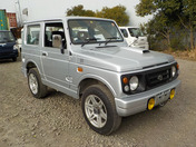 It is a picture of the silver suzuki jimny in 1996,First Photo Stock No.Y035198