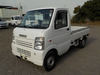 It is a picture of the white suzuki carry truck in 2005,Sub Photo 1 Stock No.Y035286