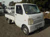 It is a picture of the white suzuki carry truck in 2002,Sub Photo 0 Stock No.Y035321