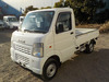 It is a picture of the white suzuki carry truck in 2006,Sub Photo 1 Stock No.Y035401