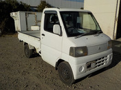It is a picture of the white mitsubishi minicab truck in 2004,First Photo Stock No.Y035499
