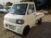 It is a picture of the white mitsubishi minicab truck in 2004,Sub Photo 1 Stock No.Y035499