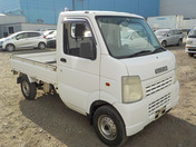 It is a picture of the white suzuki carry truck in 2003,First Photo Stock No.Y035527