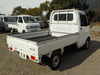 It is a picture of the white suzuki carry truck in 2003,Sub Photo 2 Stock No.Y035527