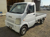 It is a picture of the white suzuki carry truck in 2003,Sub Photo 1 Stock No.Y035527
