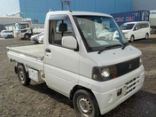 It is a picture of the white mitsubishi minicab truck in 2005,First Photo Stock No.Y035626