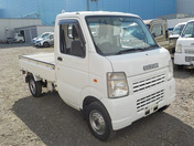 It is a picture of the white suzuki carry truck in 2007,First Photo Stock No.Y035758