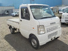 It is a picture of the white suzuki carry truck in 2007,Sub Photo 0 Stock No.Y035758