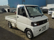 It is a picture of the white mitsubishi minicab truck in 2002,First Photo Stock No.Y035766