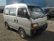 It is a picture of the silver honda acty passenger van in 1993,First Photo Stock No.Y035870