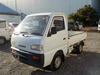 It is a picture of the white suzuki carry truck in 1995,Sub Photo 1 Stock No.Y035977