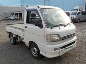 It is a picture of the white daihatsu hijet truck in 2003,First Photo Stock No.Y035993
