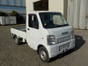 It is a picture of the white suzuki carry truck in 2006,Sub Photo 0 Stock No.Y036034