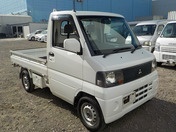 It is a picture of the white mitsubishi minicab truck in 2005,First Photo Stock No.Y036044