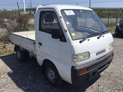 It is a picture of the white suzuki carry truck in 1993,First Photo Stock No.Y036045