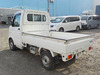 It is a picture of the white suzuki carry truck in 2004,Sub Photo 3 Stock No.Y036050