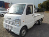 It is a picture of the white suzuki carry truck in 2004,Sub Photo 1 Stock No.Y036050