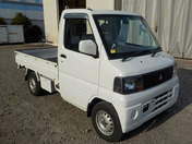 It is a picture of the white mitsubishi minicab truck in 2004,First Photo Stock No.Y036052