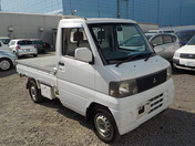 It is a picture of the white mitsubishi minicab truck in 2001,First Photo Stock No.Y036376