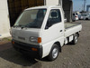 It is a picture of the white suzuki carry truck in 1995,Sub Photo 1 Stock No.Y036565