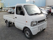 It is a picture of the white suzuki carry truck in 2001,First Photo Stock No.Y036578
