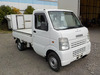 It is a picture of the white suzuki carry truck in 2003,Sub Photo 0 Stock No.Y036701