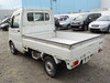 It is a picture of the white suzuki carry truck in 2003,Sub Photo 2 Stock No.Y036701
