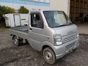 It is a picture of the gray suzuki carry truck in 2003,First Photo Stock No.Y036823