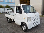 It is a picture of the white suzuki carry truck in 2012,First Photo Stock No.Y036824