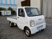 It is a picture of the white suzuki carry  truck in 2007,First Photo Stock No.Y036884