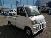 It is a picture of the white mitsubishi minicab truck in 1999,First Photo Stock No.Y037444