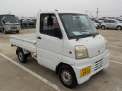 It is a picture of the white mitsubishi minicab truck in 1999,First Photo Stock No.Y037671
