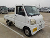 It is a picture of the white mitsubishi minicab truck in 1999,Sub Photo 0 Stock No.Y037671