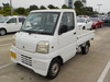 It is a picture of the white mitsubishi minicab truck in 1999,Sub Photo 1 Stock No.Y037671