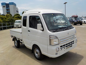 It is a picture of the white suzuki carry jumbo in 2021,First Photo Stock No.Y037835