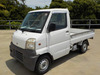 It is a picture of the white mitsubishi minicab truck in 1999,Sub Photo 1 Stock No.Y037955